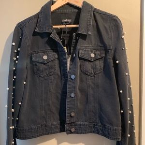 New black BEBE Jean jacket with pearl sleeves